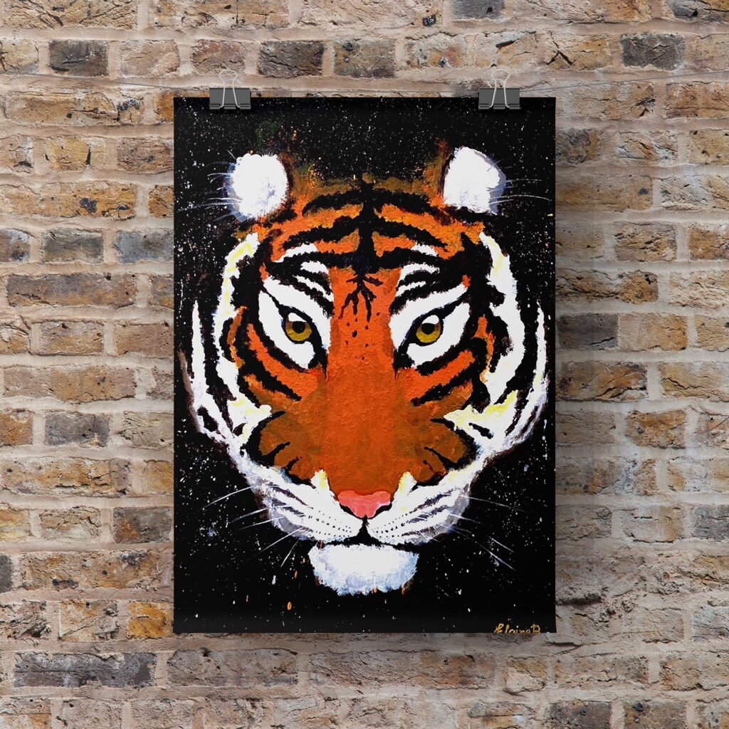 Painting of a tiger's face hanging on a brick wall.
