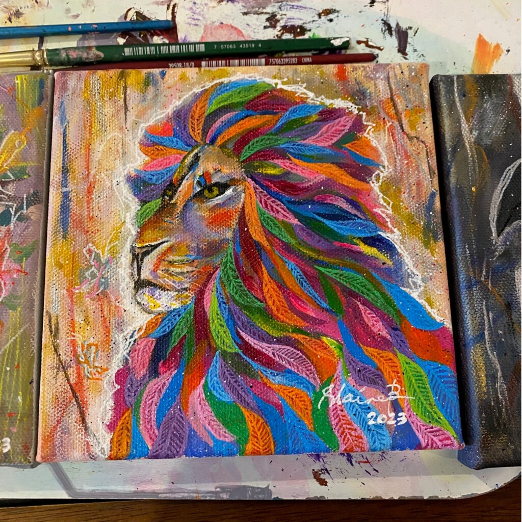 Painting of a lion with colorful mane.